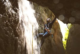 A boy faces a rope passage during Canyoning in Rio Inferno organized by Rockonda.
