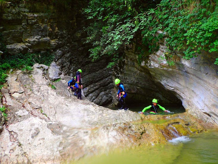 Children are doing Canyoning in the Canyoning in Torrente Vione - Gumpenfever organized by Skyclimber.