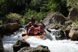 Picture of people descending the river with a huge smile during the Adventure Rafting in the Lao Gorges with Pollino Rafting.