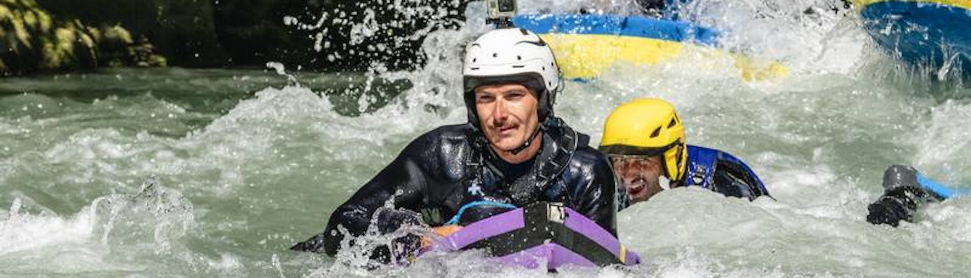 A man is enjoying hydrospeed on the Haute-Isère river with AN Rafting Savoie.