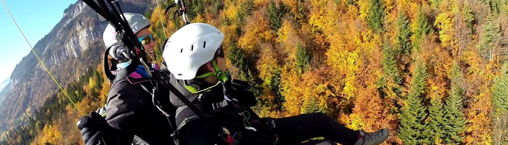 A person is enjoying his Tandem Paragliding at Planpraz - Voltige activity with Les Ailes du Mont Blanc.