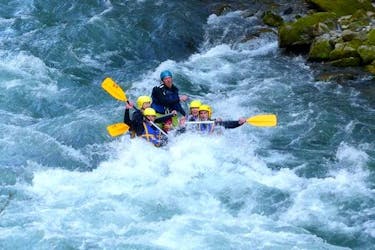 A group of friends is enjoying their Rafting on Dranse River - Special activity with AN Rafting Haute-Savoie.