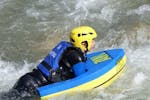 A person is participating in a Hydrospeed on Dranse River - Discovery activity with AN Rafting Haute-Savoie.