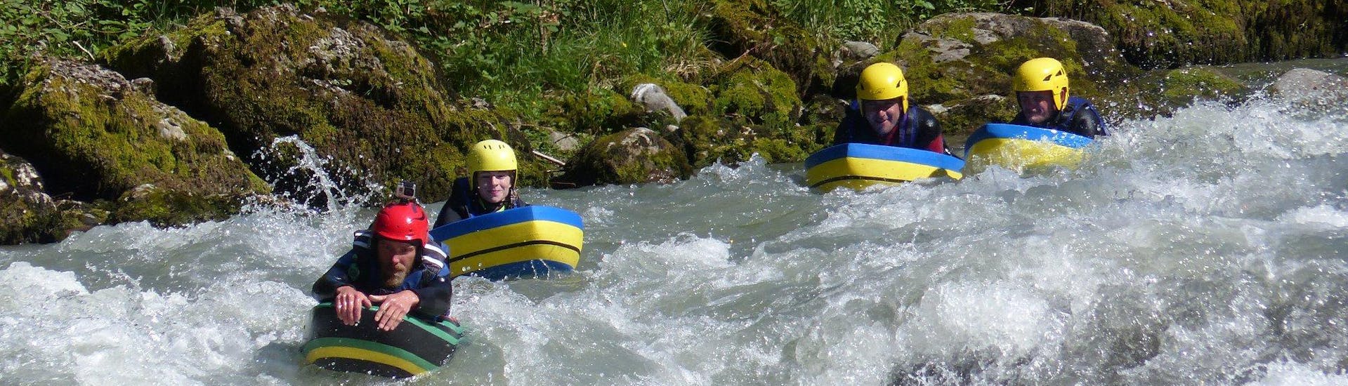 A group is enjoying their Hydrospeed on Dranse River - Discovery activity operated by AN Rafting Haute-Savoie.