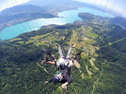 A person does their first Discovery Tandem Paragliding in Annecy - Col de la Forclaz with Takamaka Annecy.