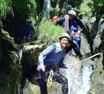 A group of friends is enjoying their Canyoning in Canyon d'Angon - Classic activity with FBI Parapente.