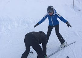 Participant and ski instructor in Bormio during one of the Private Ski Lessons for Adults of All Levels.