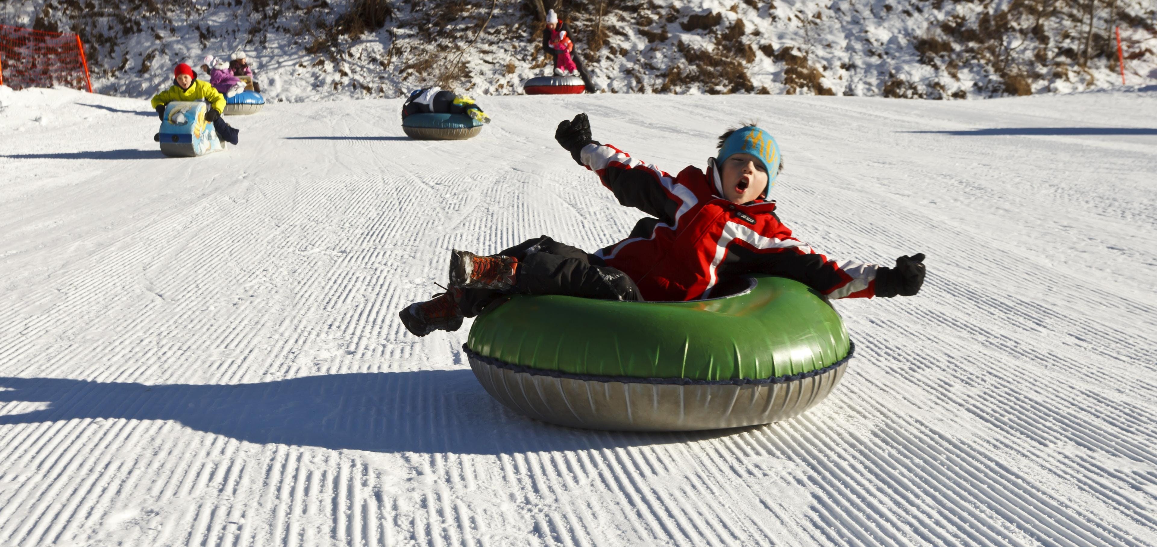Kid having fun in Bormio during the Mini Club (3-10 years). 
