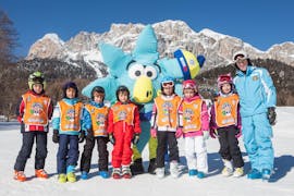 A group of kids ready for the Kids Ski Lessons (4-6 y.) for Beginners from Scuola di Sci e Snowboard Cristallo Cortina.