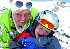 A boy is enjoying his private ski lessons for kids with ski school Club Alpin in Grän.