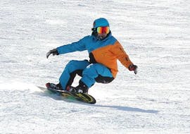 Kids Snowboarding Lessons (from 5 y.) for All Levels from Ski School Amigos Snowsports Mariazell.