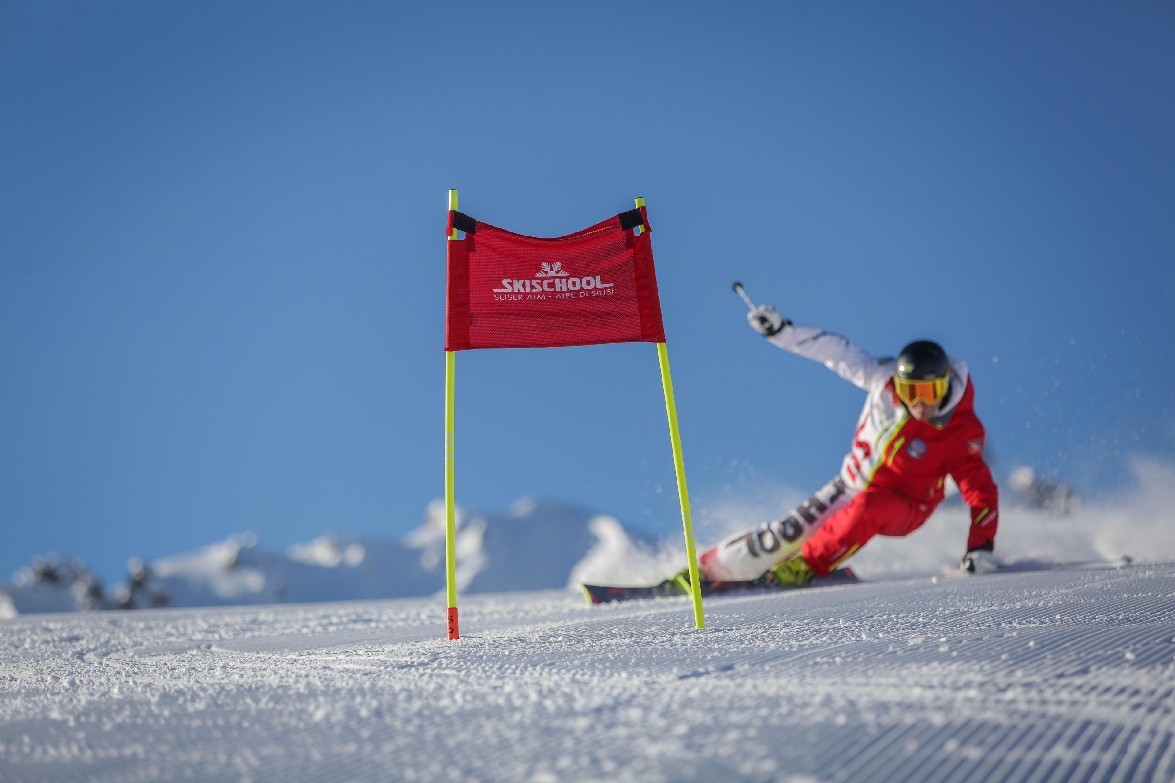 An advanced skier during the kids ski lessons with Scuola di Sci Alpe di Siusi.