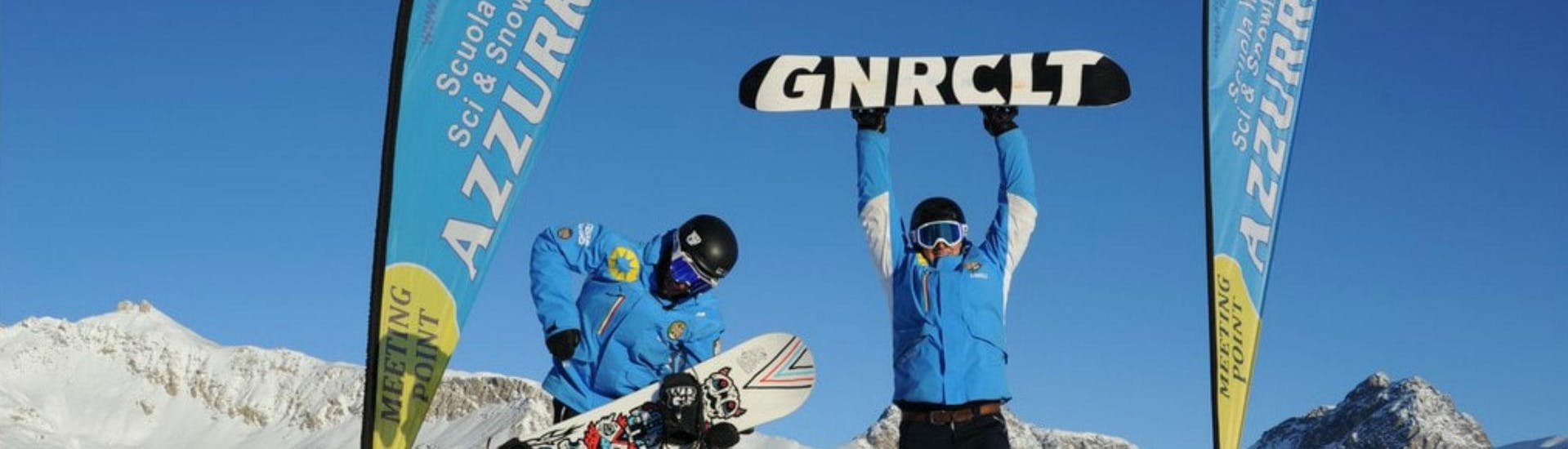 Two snowboarders are seemingly excited about their Private Snowboarding Lessons for Kids & Adults - All Levels with the ski school Scuola di Sci Azzurra Livigno.