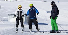 People are participating at adult ski lessons for beginners with ski school Neustift Olympia at Stubai glacier.