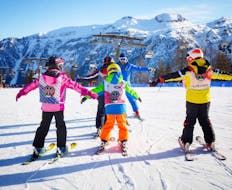 Kids Ski Lessons (3-5 years) - First Timer of Folgarida Dimaro Ski School are taking place, the children are training on the slopes of Val di Sole.