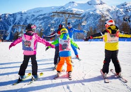 Kids Ski Lessons (3-5 years) - First Timer of Folgarida Dimaro Ski School are taking place, the children are training on the slopes of Val di Sole.
