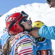 A little child is having lots of fun during the Private Ski Lessons for Kids - Val d'Isère in the safe environment of 333 Ski School.