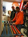 Picture of the owners of the Ski Rental Snow Experts Mittersill-Pass Thurn inside the shop.